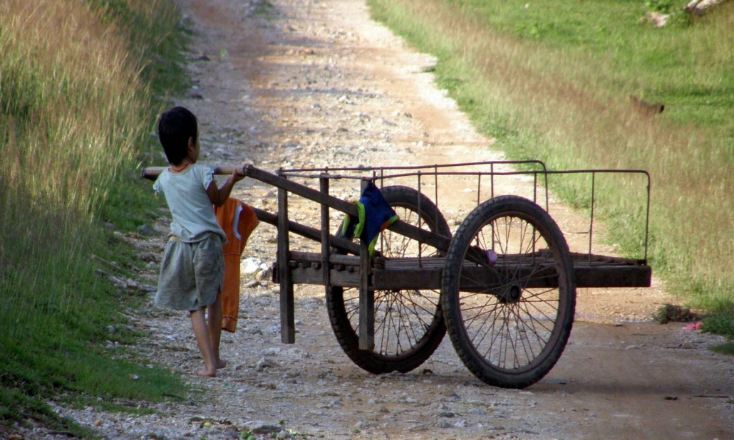 Girl pushing cart, Travel Alone as a Woman