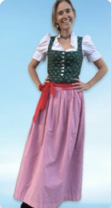 Nina dressed in Dirndl, learn German online
